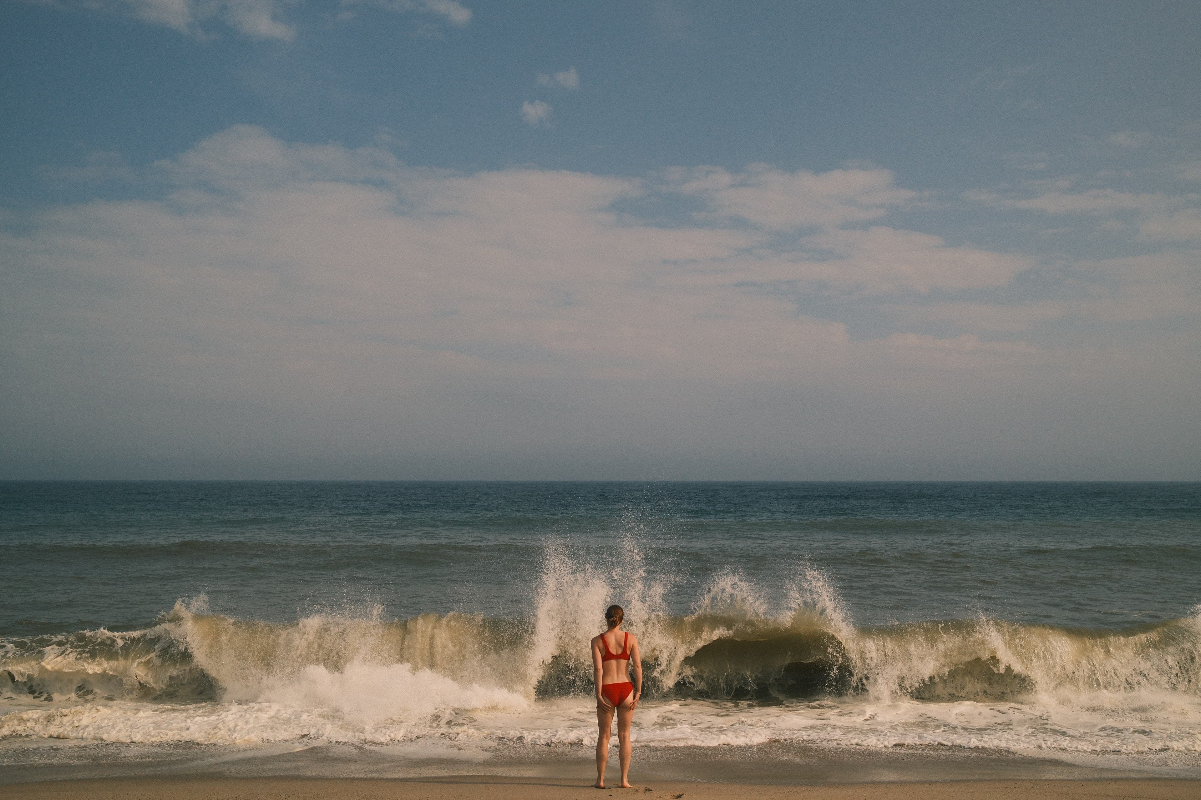 Serene ocean view with swimmer